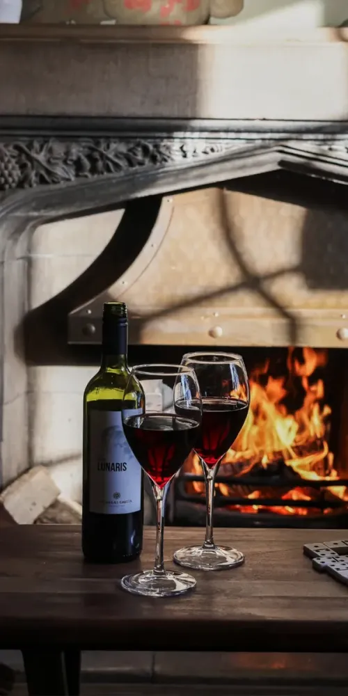 Red wine beside a roaring fire at the Unicorns Head